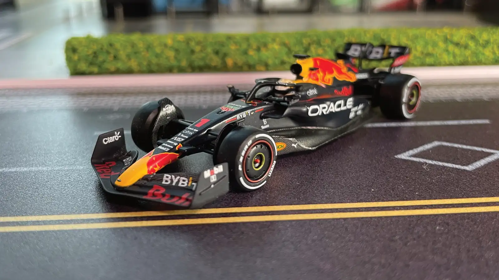 Close-up inspection of F1 Max Verstappen die-cast Red Bull F1 1:64 Scale