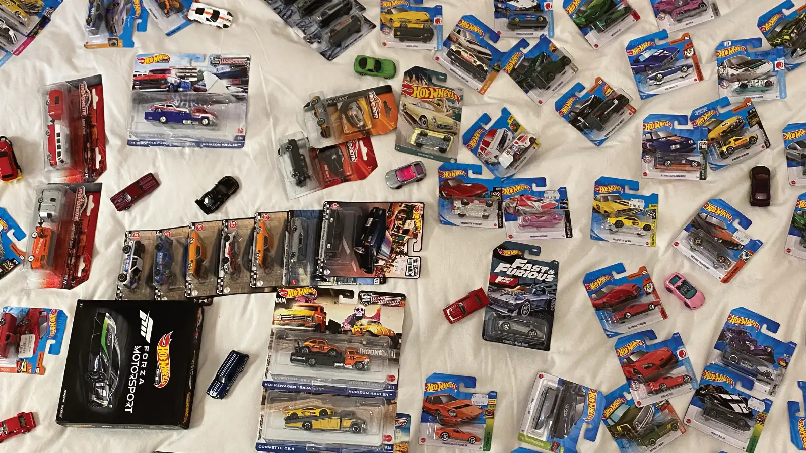 A mass collection of diecast cars